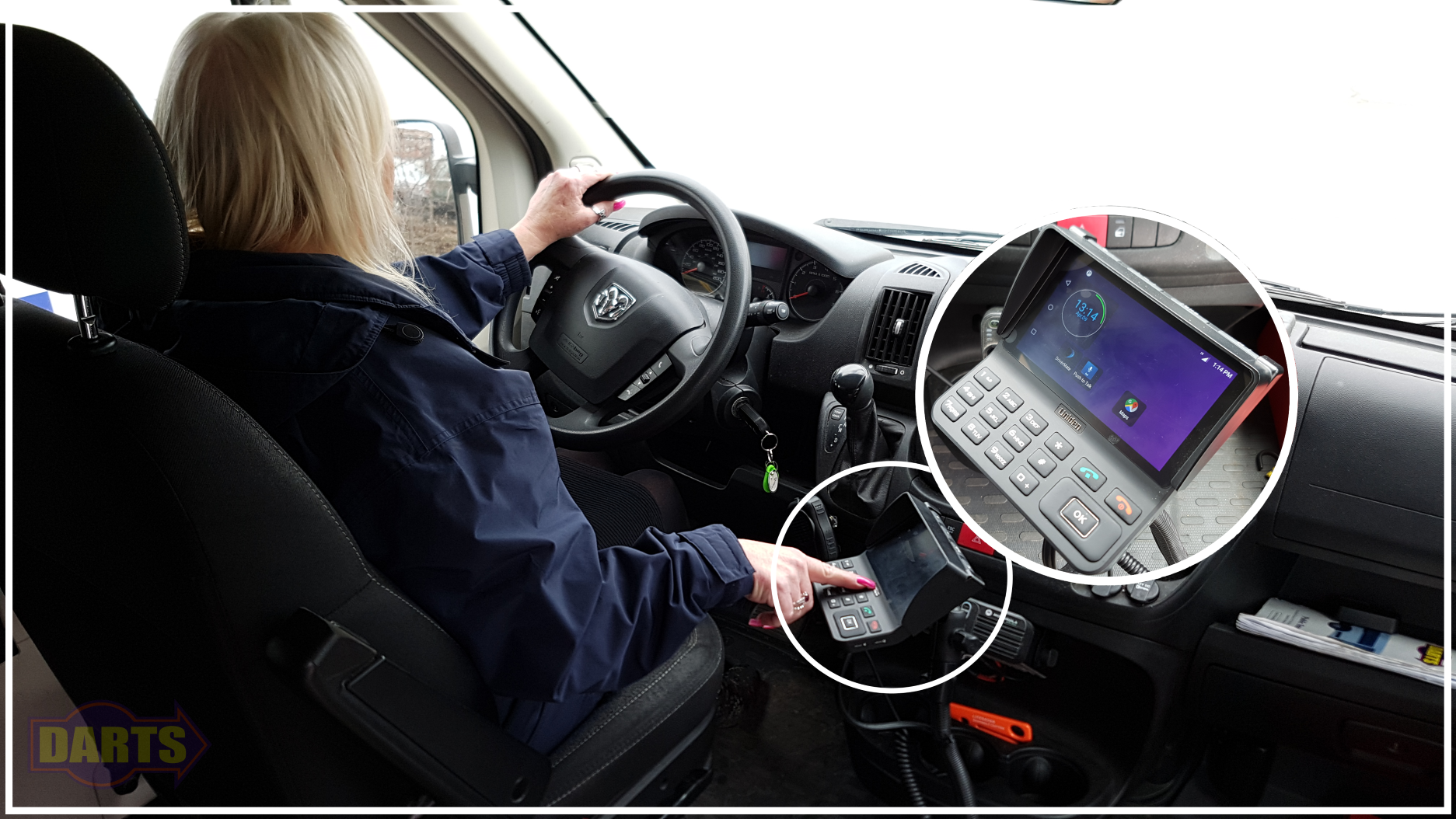 DARTS driver using ride management software in vehicle.